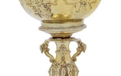 An early 19th century Continental goblet, the bowl and foot stamped with Austro-Hungarian marks, Brunn, c.1810, the rim stamped with the Austrian Freistempe (1809/10), the baluster stem, probably replaced, designed with mask brackets supporting a...