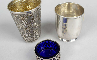 An embossed beaker, a plain christening mug & a pierced open salt with glass liner, all with Portuguese marks; together with a small footed pot with Birmingham hallmarks. (4).
