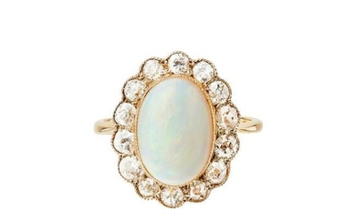 An opal and diamond set cluster ring