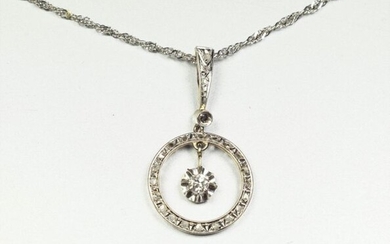 Antique pendant in 18K (750/oo) white gold and platinum (850/oo)...