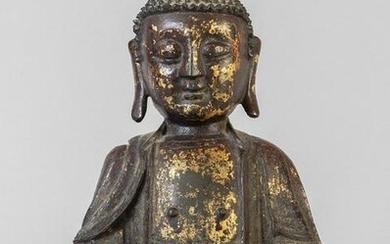 Buddha in bronzo con tracce di doratura a freddo