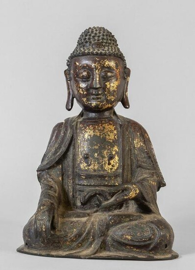 Buddha in bronzo con tracce di doratura a freddo