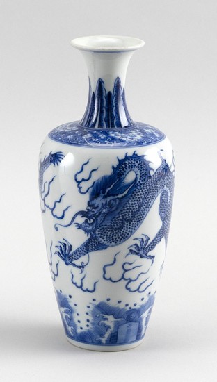 CHINESE BLUE AND WHITE PORCELAIN VASE In rouleau form, with decoration of two five-clawed dragons chasing a fiery pearl. Six-charact...