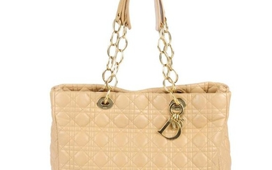 CHRISTIAN DIOR - a beige Cannage handbag. Designed with