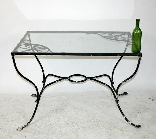 Cast iron garden table with glass top