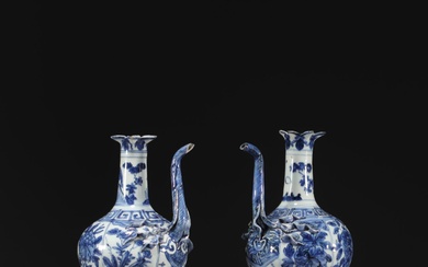 China - Pair of blue-white porcelain jugs with floral decoration,...