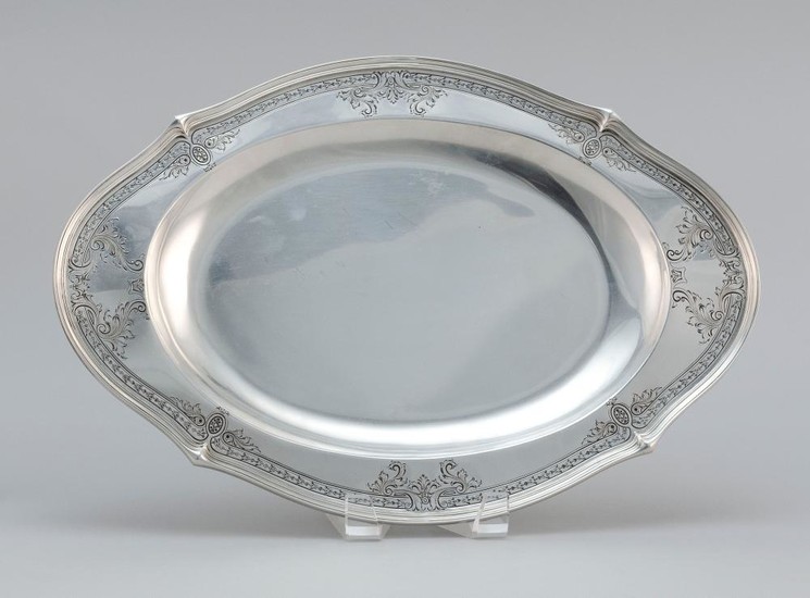 DOMINICK & HAFF STERLING SILVER PLATTER With chased foliate and husk garland border. Not monogrammed. Length 15.75". Approx. 25.5 tr...