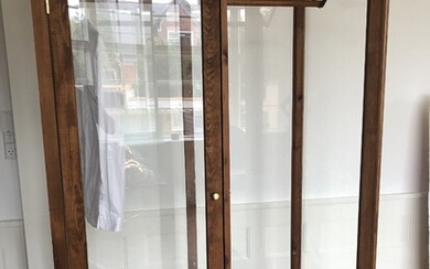 SOLD. Danish cabinetmaker: A wardrobe with wooden frame, sides, top and bottom of clear glass....