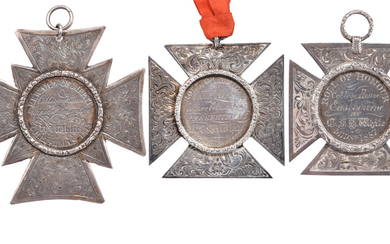 Education: three cut and engraved silver medals: crosses pattee with raised borders to the centres