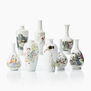 Eight small Chinese famille rose vases