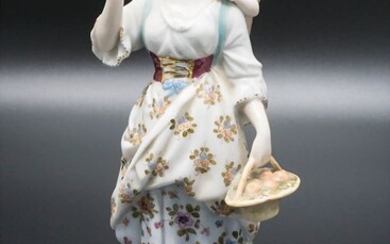 Figure 'Mutter mit Kind' / A figurine of a mother...