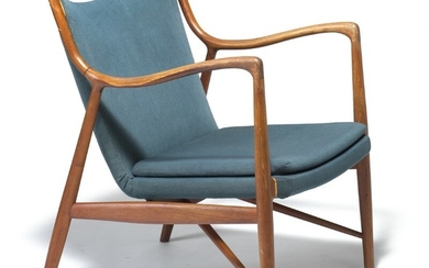 Finn Juhl: “FJ 45”. A teak easy chair. Sides, back and loose seat cusion upholstered with greenish blue wool. Made by Niels Vodder.