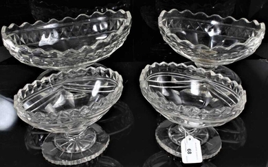 Four 19th century cut glass oval footed dishes with star cut bases, including one pair 17cm wide, and two others