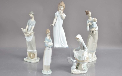Four Lladro figures and a Nao example