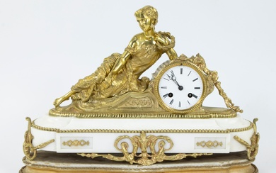 French ormolu and white marble mantle clock surmounted by a reclining figure on a stepped marble base on a marble plinth, medaille d'argent circa 1850