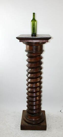 French wine press screw mounted as pedestal