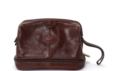 NOT SOLD. Gianni Conti: A toiletry pouch made of brown leather with one zipped compartment,...