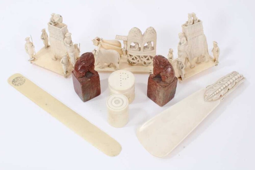Group of antique ivory to include three processional figures, tow carved soapstone figures and other items