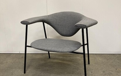 SOLD. Gubi: "Masculo" lounge chair upholstered with grey fabric, frame of black lacquered metal. Manufactured by Gubi. H. 68. W. 80 cm. – Bruun Rasmussen Auctioneers of Fine Art