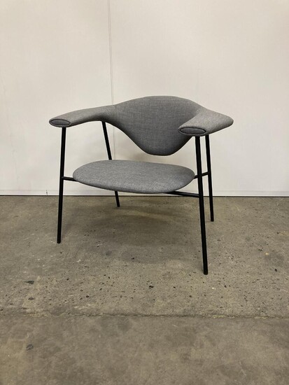 SOLD. Gubi: "Masculo" lounge chair upholstered with grey fabric, frame of black lacquered metal. Manufactured by Gubi. H. 68. W. 80 cm. – Bruun Rasmussen Auctioneers of Fine Art