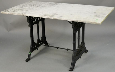Iron base table with rectangle marble top. ht. 28 in.