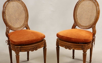 LOUIS XVI PAIR WALNUT AND CANE BACK SIDE CHAIRS