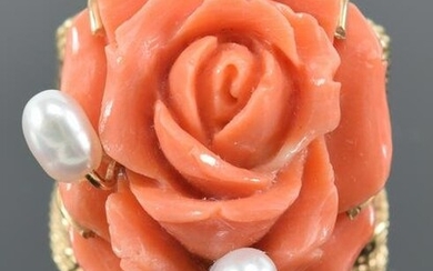Large 14kt gold and coral carved ring. Flower carved