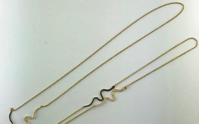 Long necklace in 750°/°° gold set with snakes set with black and brilliant diamonds, L 55cm, Gross weight: 11,85g