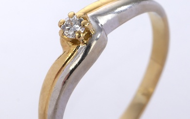 Modern solitaire ring of 18 kt. two-tone gold, approx. 0.08 ct.