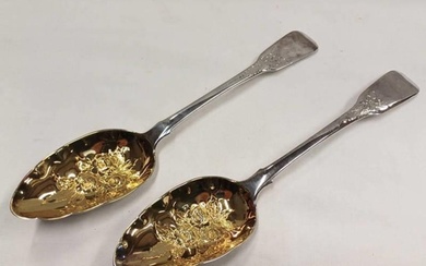 PAIR OF GEORGE III SILVER BERRY TABLESPOONS WITH GILDED FOLI...