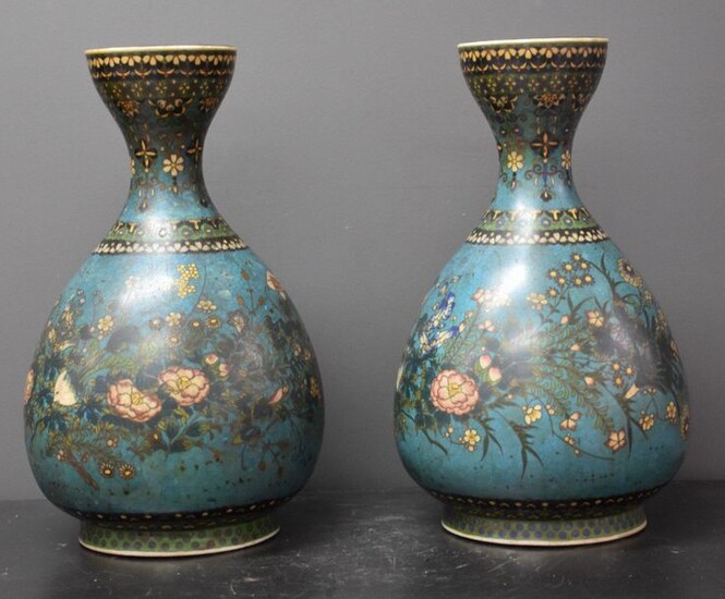 Pair of Japanese porcelain vases imitating the Chinese cloisonne. Ht 36 cm. Cooking crack on the shard.