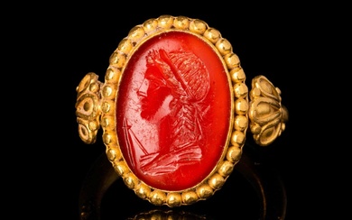 ROMAN CARNELIAN INTAGLIO DEPICTING YOUNG WINNER OF THE GAMES IN...