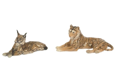 Royal Copenhagen: A Royal Copenhagen porcelain model of a seated tiger, model 714