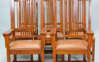 SET OF EIGHT ARTS AND CRAFTS OAK DINING CHAIRS