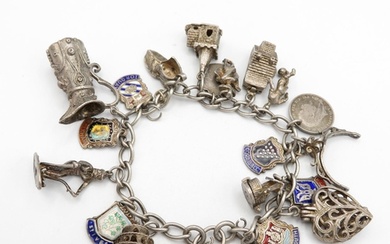 Silver charm bracelet with assorted charms - place names and...