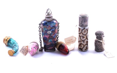 Six various scent and smelling salts bottles