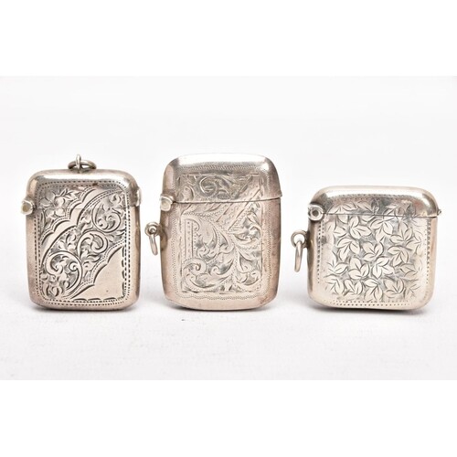 THREE EARLY 20TH CENTURY SILVER VESTAS, each with an engrave...