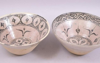 TWO ISLAMIC PARTLY GLAZED POTTERY BOWLS, each similarly