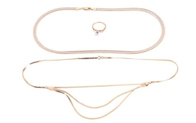 Two 9ct gold necklaces and a diamond solitaire ring; the first necklace consists of a flat herringbo