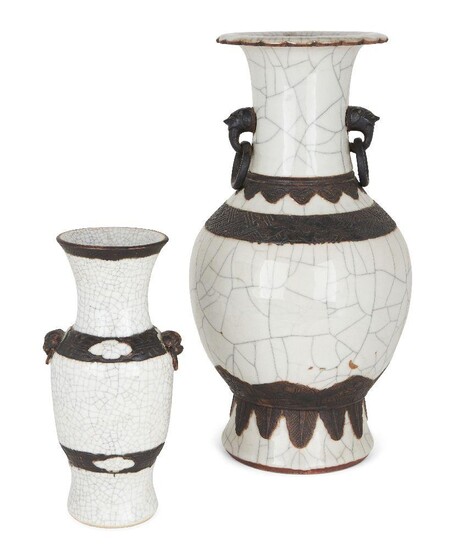 Two Chinese porcelain Ge-type vases, late Qing dynasty, both with moulded ring handles and archaistic motifs, covered in a white crackle glaze, incised brown ground four-character marks to bases, 25.5cm-42cm high (2)