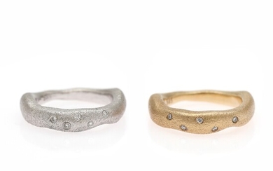 NOT SOLD. Two diamond rings each set with five brilliant-cut diamonds, mounted in respectively 14k...