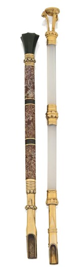Two early 19th century dip pens, each with bramah style gold nib holders with sliding lock system, one with colourless chalcedony shaft, gold mounts and gold mounted foiled garnet seal top engraved with a bee motif, approx. length 17cm; the other...