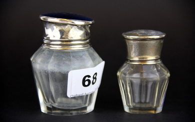 Two hallmarked silver topped and cut glass perfume bottles, tallest H. 7.5cm. (one A/F)
