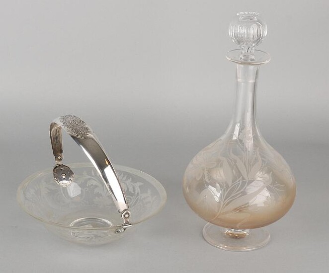 Two parts crystal with silver, a carafe and bowl