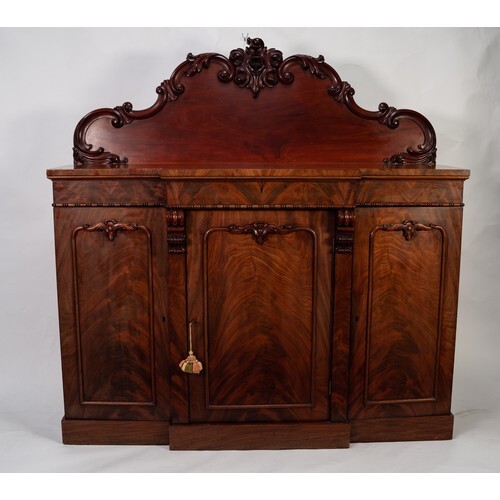 VICTORIAN CARVED AND FIGURED MAHOGANY BREAKFRONT SIDEBOARD, ...