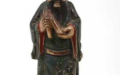 "Vieux sage" en pierre de lave sculptée et polychromée. Travail chinois. Epoque : XVIIIème. (* à l’élément dans la main et recollé sur la base). H.(base comprise):+/-15,5cm.