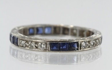 White gold (tests 18ct) diamond and sapphire full eternity r...