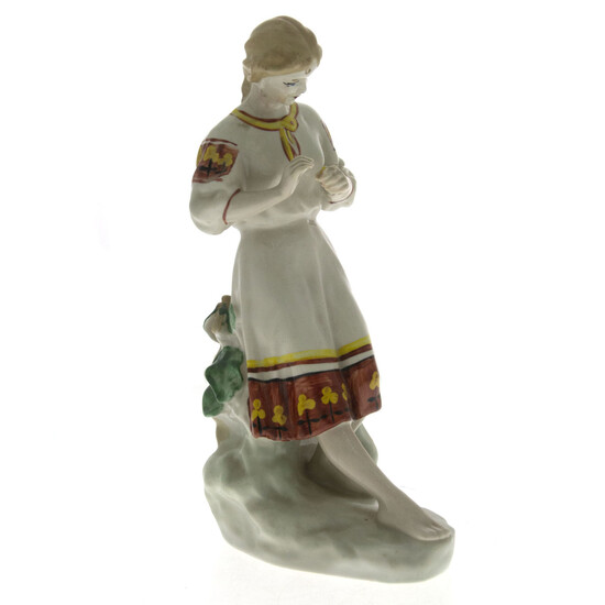 Woman with Flower Porcelain Figure.