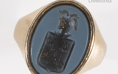 Yellow gold signet ring engraved with a coat of arms...