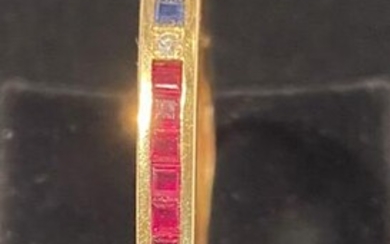 18CT YELLOW GOLD SAPPHIRE RUBY AND EMERALD BANGLE